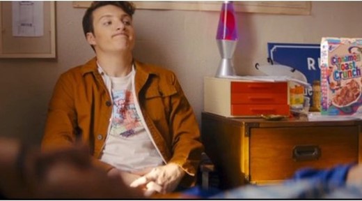 A box of Cinnamon Toast Crunch displayed in the background in a scene from This is The Year.