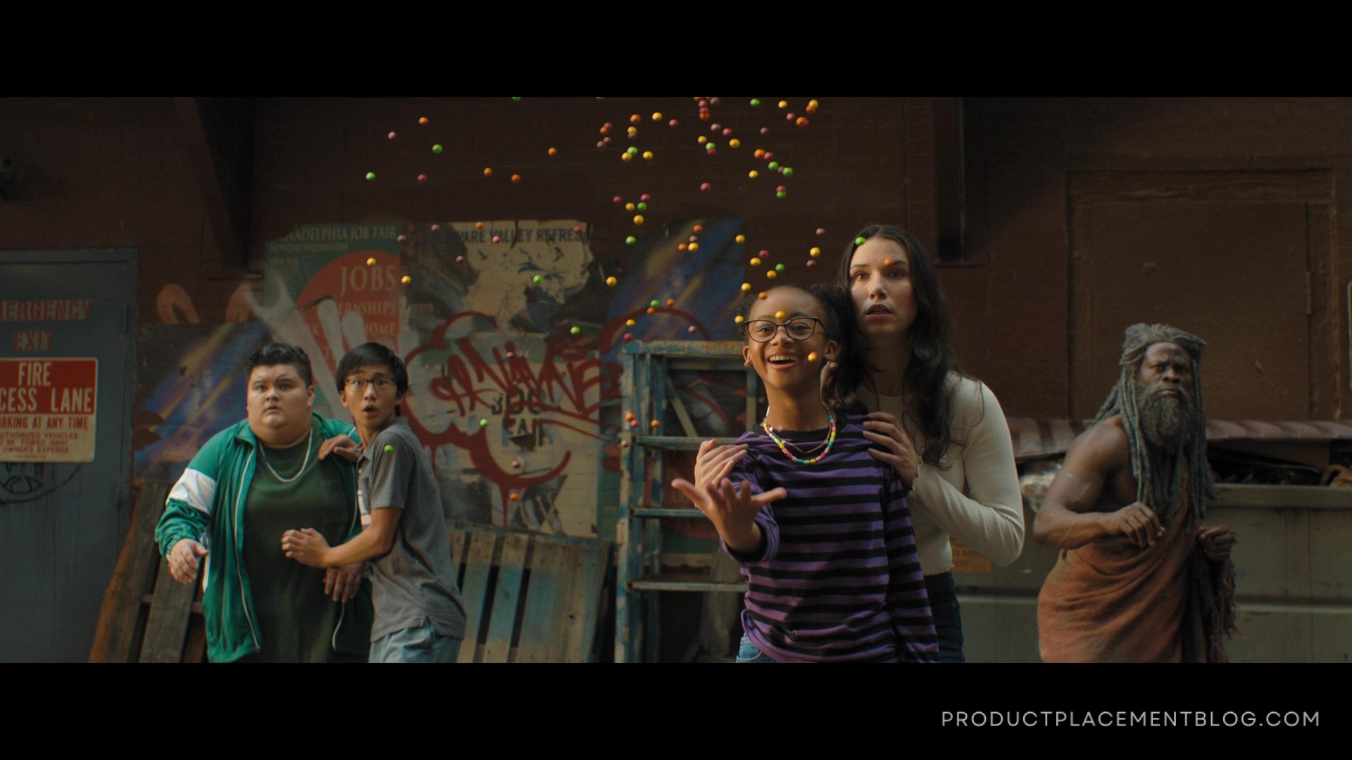 Character throwing Skittles in the air in Shazam Fury of the Gods