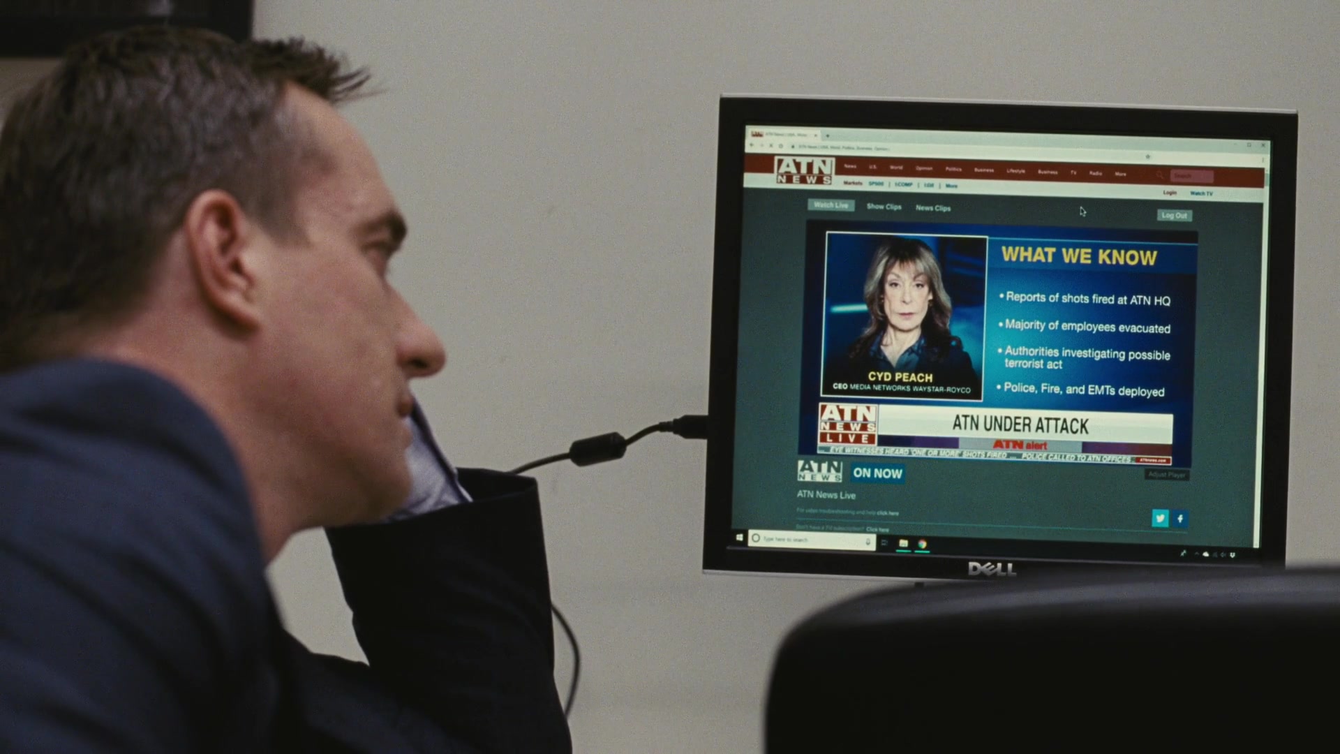 Dell monitor displayed on a scene from Succession.