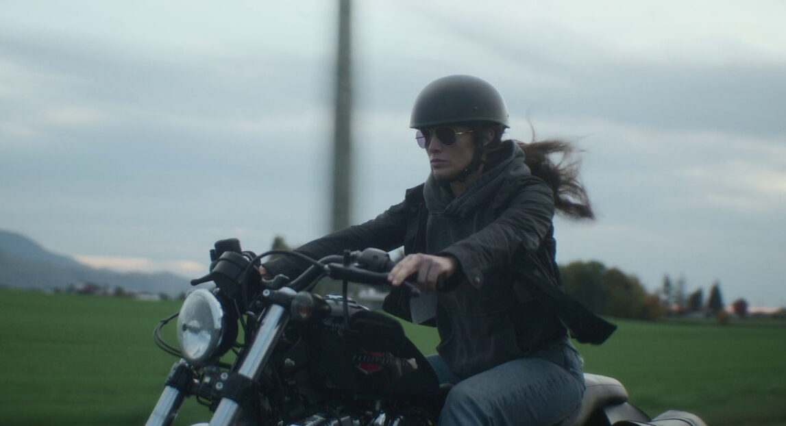 Jennifer Lopez riding a Harley-Davidson Motorcycle in The Mother