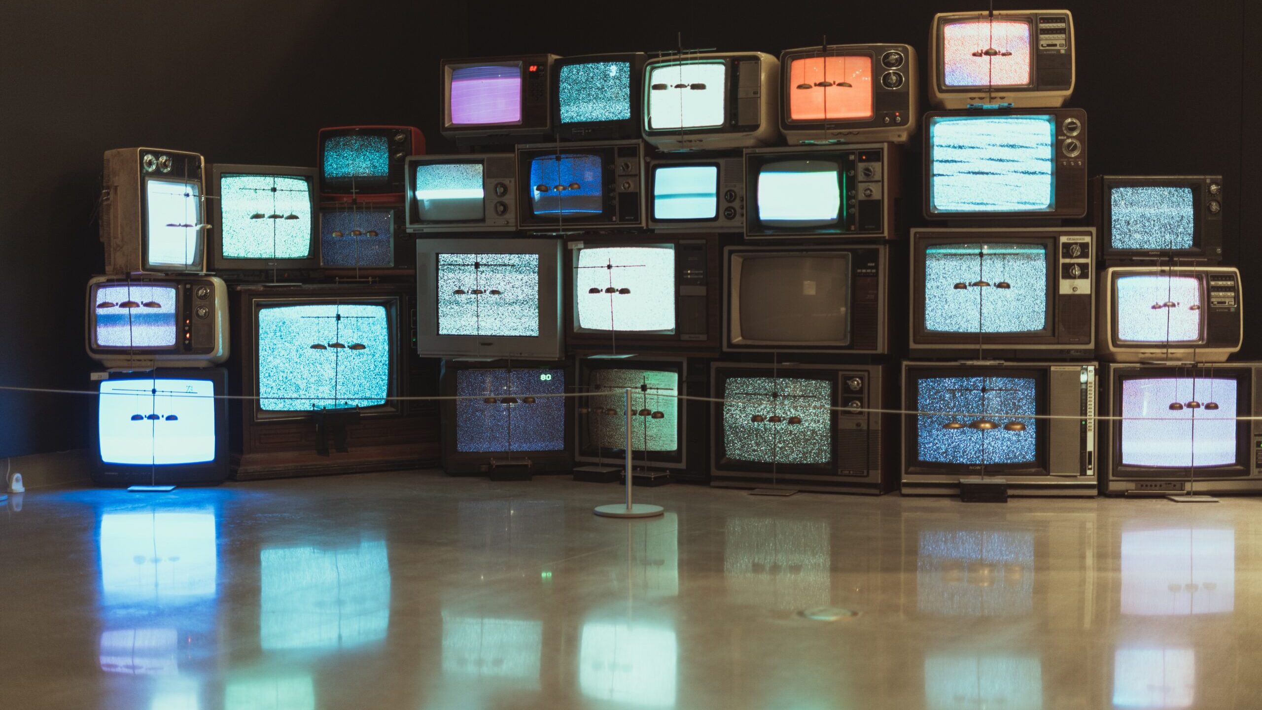 Old TVs displayed in an exhibition