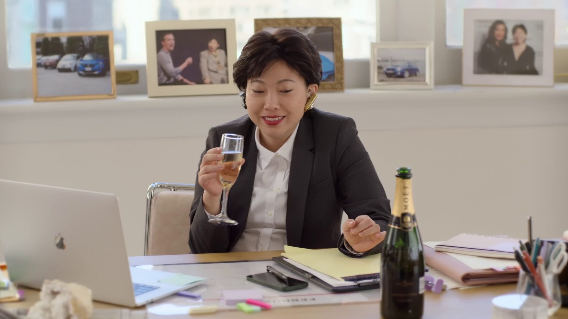 Character drinking Moët & Chandon in Awkwafina Is Nora From Queens