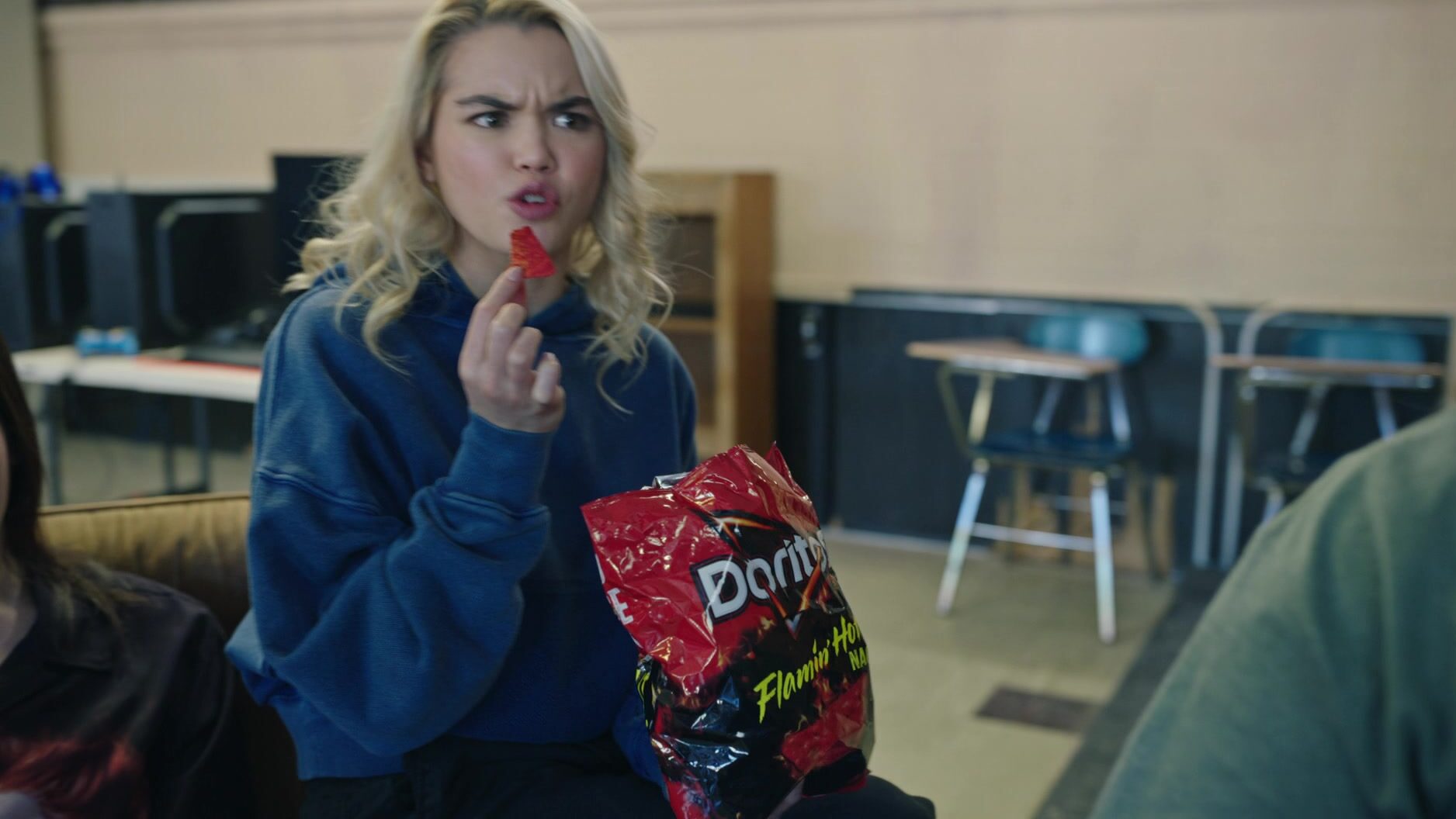 Doritos Flamin Hot Nacho flavored tortilla chips enjoyed by Paris Berelc as Vivian (V) in 1UP