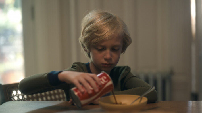 Coca-Cola cans appear in various scenes in The Crowded Room